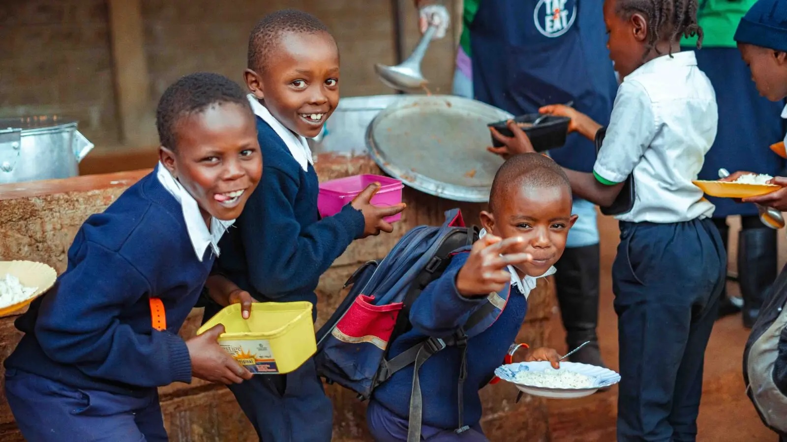 Pupils enjoying a meal at school